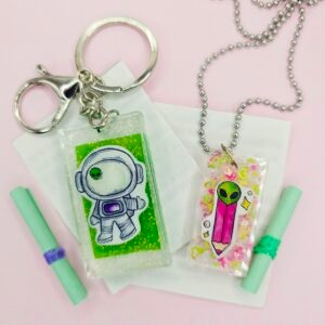Par de Amuletos Astroboy (llavero y collar)